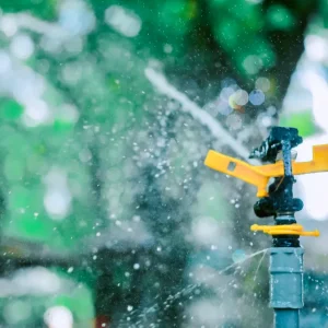 How to Fix Low Water Pressure in a Sprinkler System — Sprinkler System in a Green Park Setting