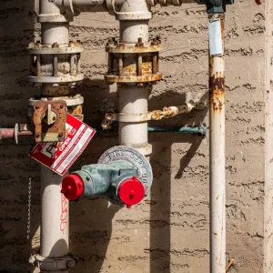 Utility pipes with a water meter and valves