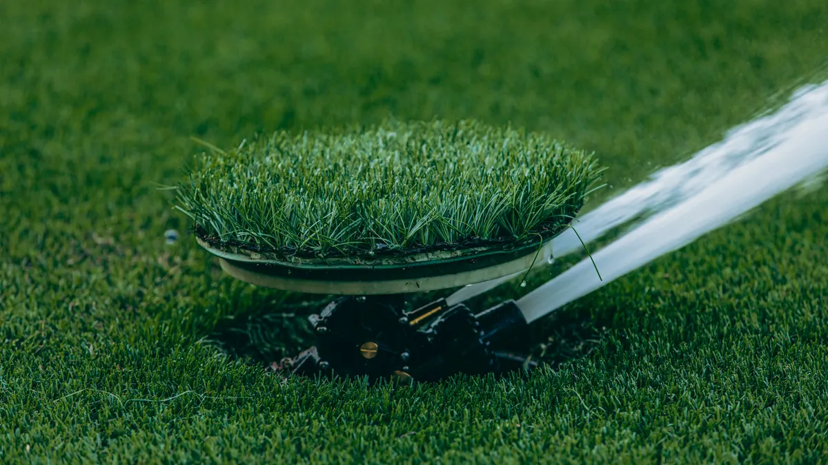 In-Ground Sprinkler System vs Hose-End Sprinklers: Which Fits Your Yard? In-Ground Sprinkler System vs Hose-End Sprinklers: Which Fits Your Yard? — Automatic Sprinkler Watering Green Lawn Close