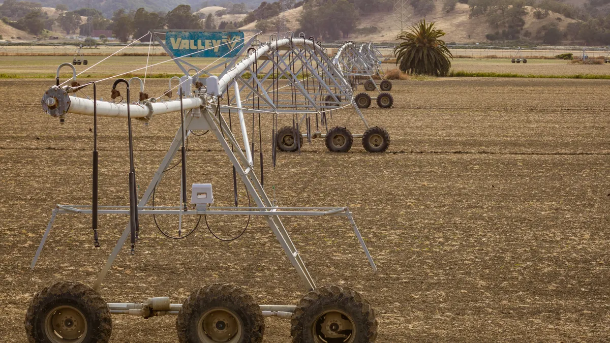 Irrigation water source and capacity planning — The Complete Guide Wheeled center-pivot irrigation rig in a field